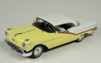 1 1957 OLDSMOBILE STARFIRE SEDAN, YELLOW & ALCAN WHITE.