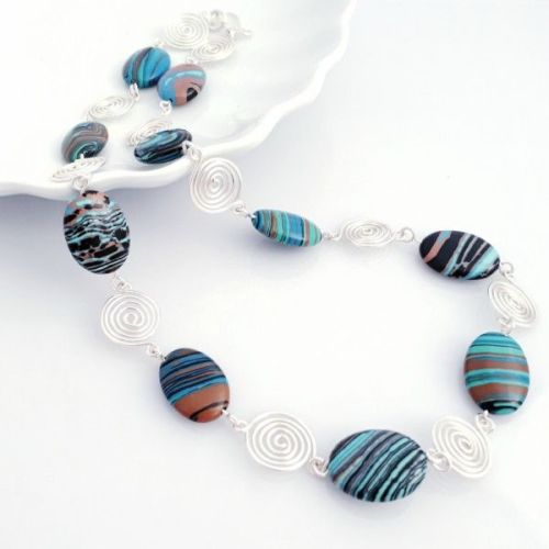 Blue Malachite and silver open spirals necklace