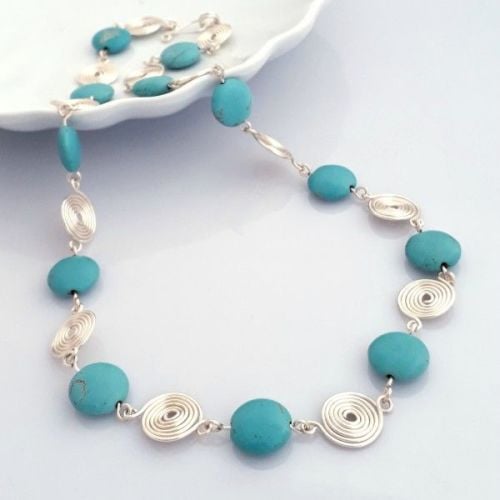 Turquoise coins and open spirals necklace