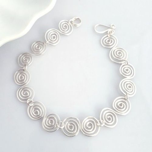 Silver Celtic infinity spiral bracelet by Spirales d'argent Tammy Betson
