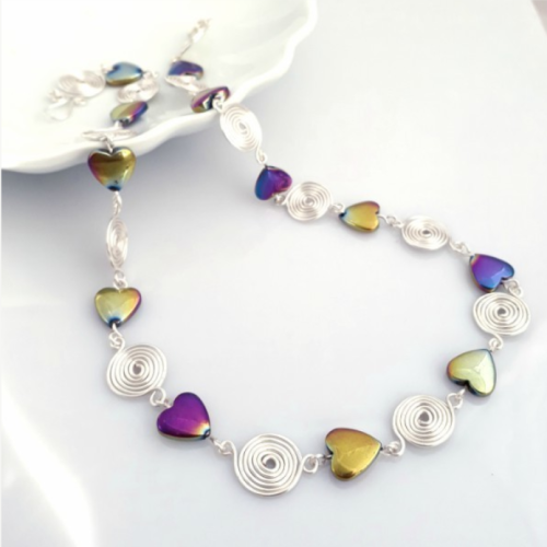 Rainbow Hematite hearts and closed spirals necklace