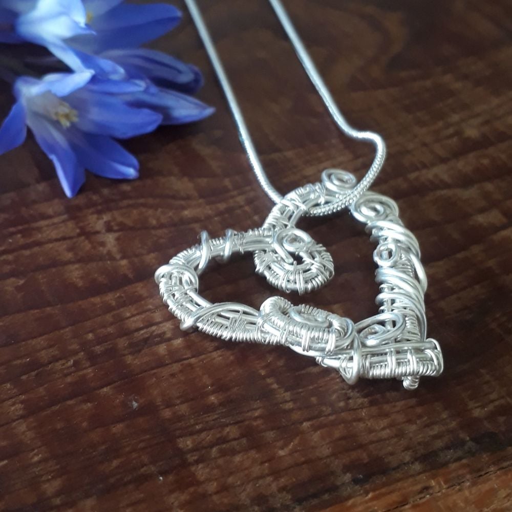 Silver wire wrapped heart pendant