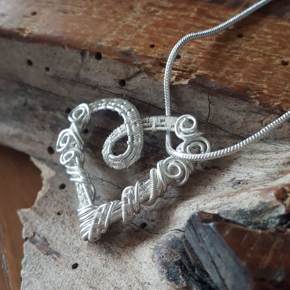 Fine Silver wire wrapped heart pendant