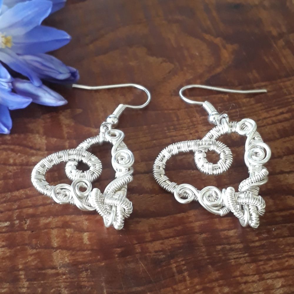 Silver wire wrapped heart earrings