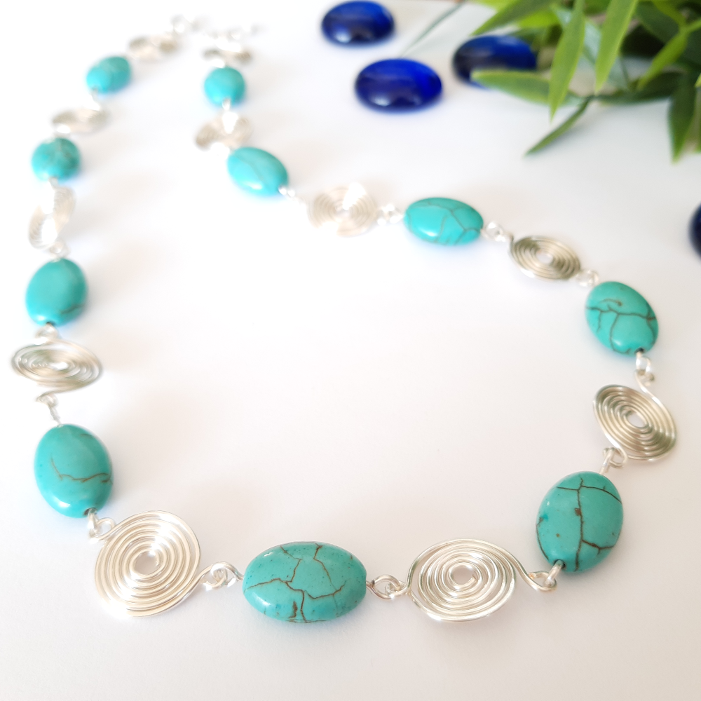 Turquoise coins and open spirals necklace