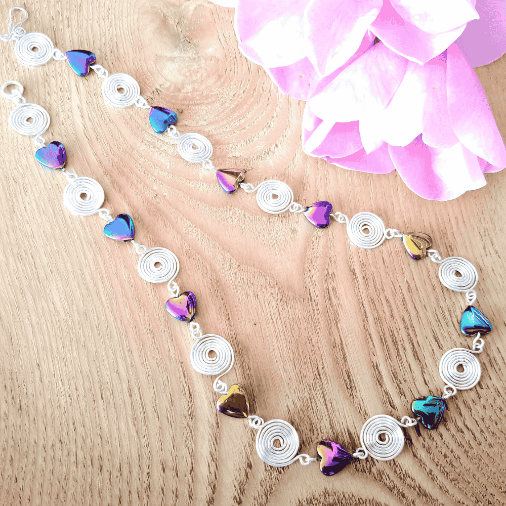 Rainbow Hematite hearts and closed spirals necklace