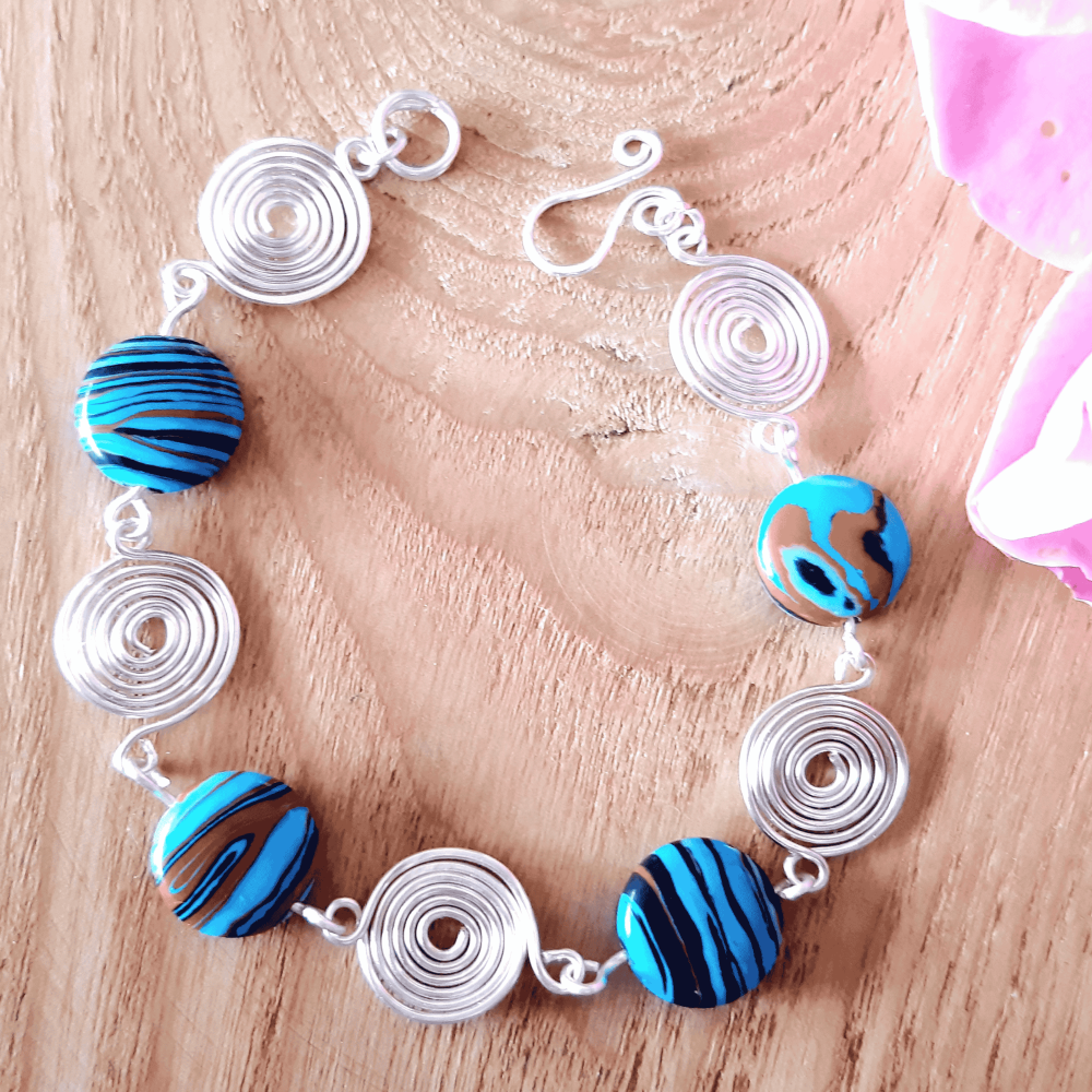 Blue stripped Malachite and silver open spirals bracelet