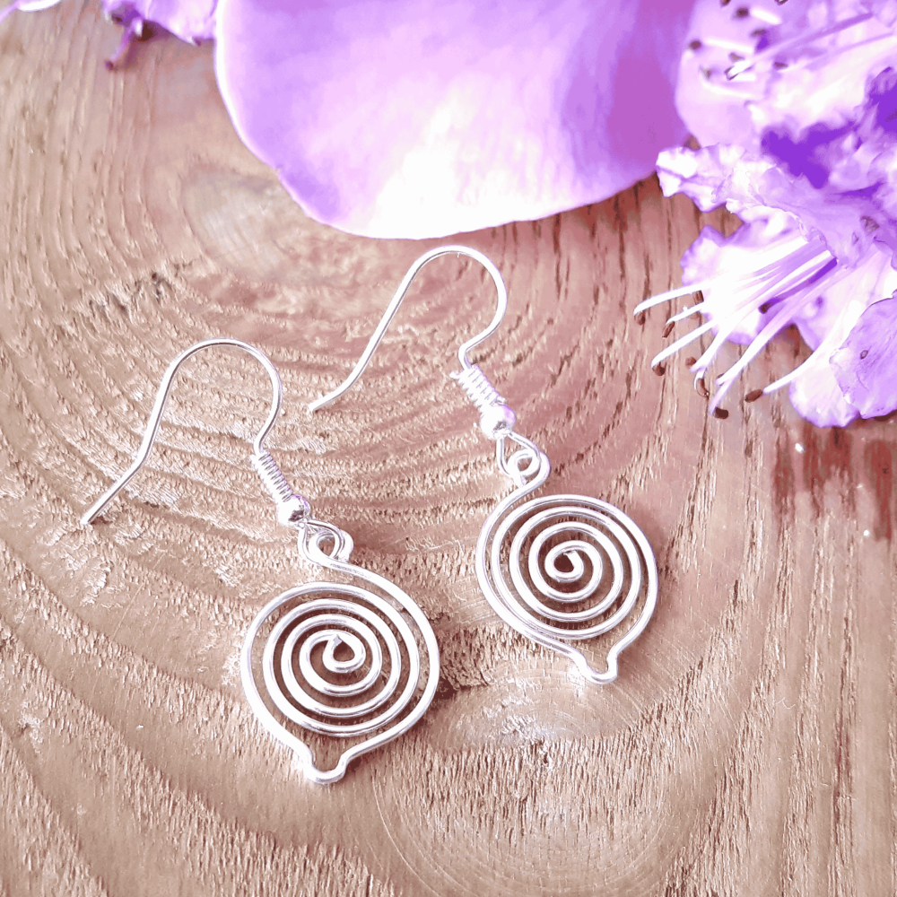 8 Tear Drop Silver Spiral Earrings