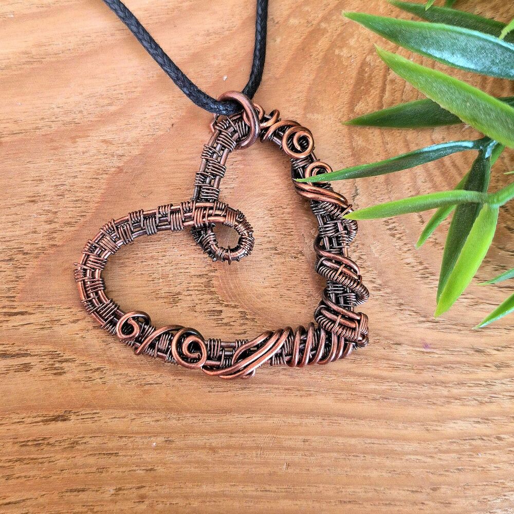 Copper wire wrapped heart pendant