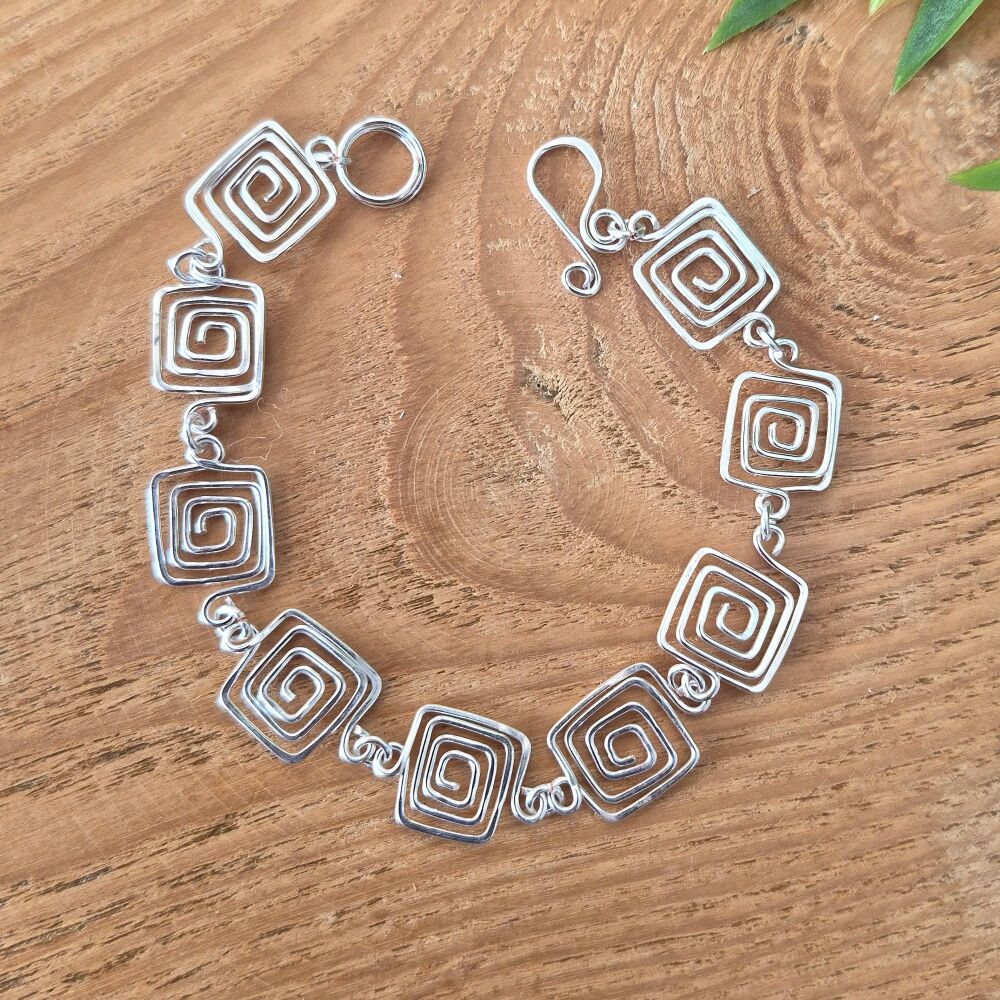 Greek key square silver spirals bracelet