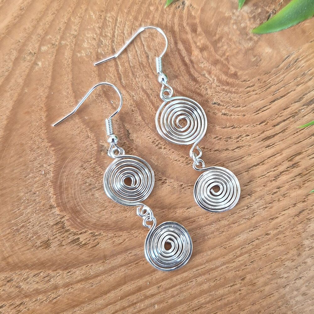 Double closed spiral earrings
