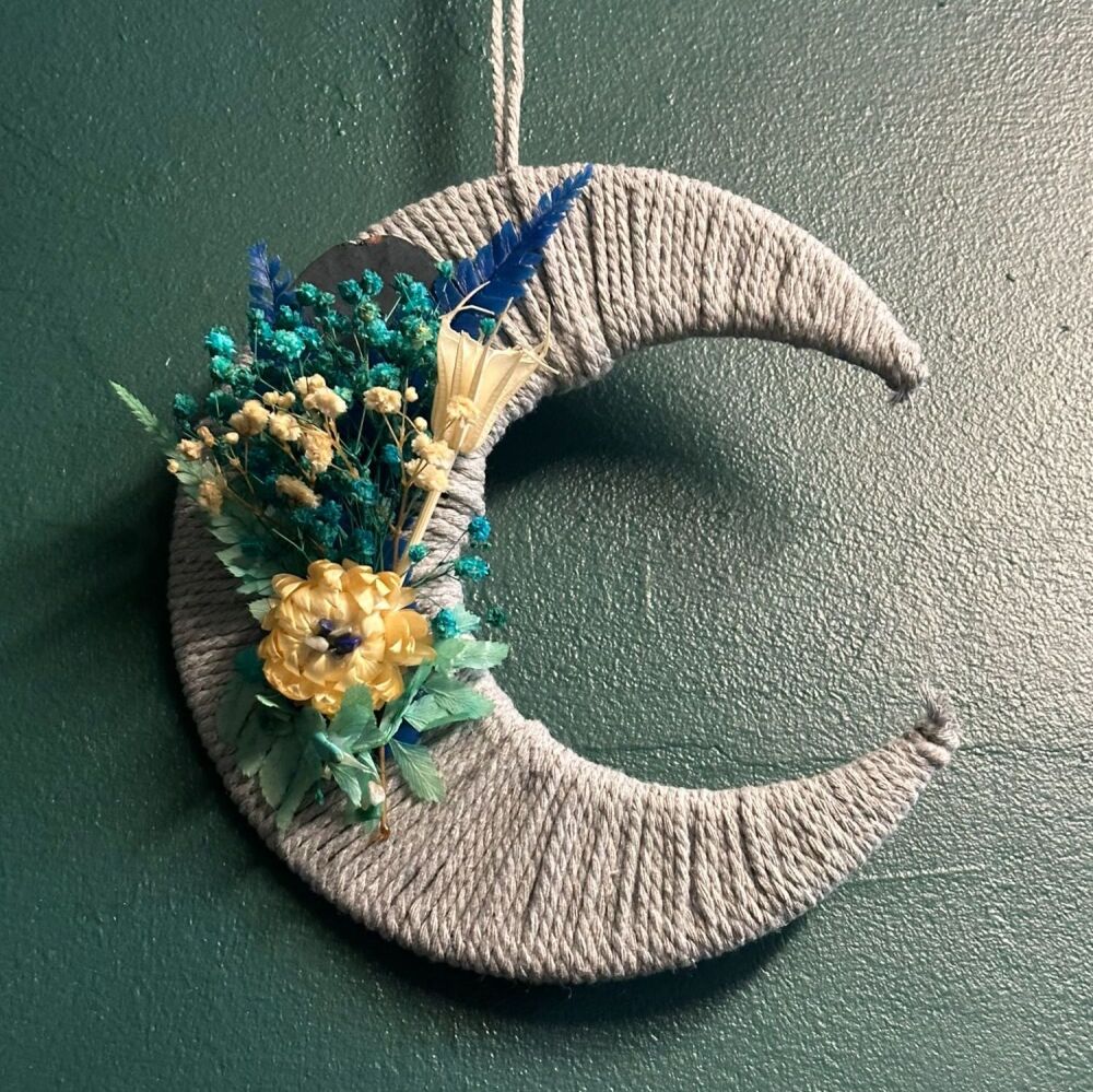 Grey hanging moon with blue and cream dried wildflowers
