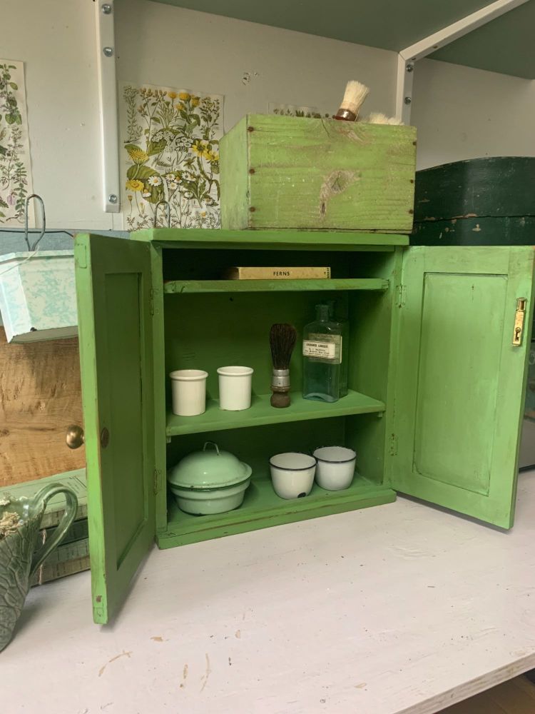 Little green painted vintage cupboard