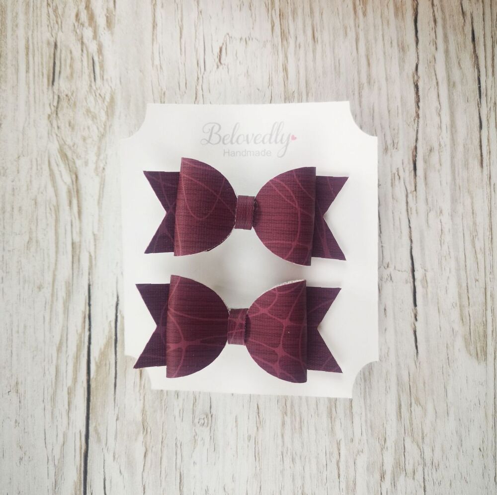 Pair of Purple patterned Faux Leather Hair Bows