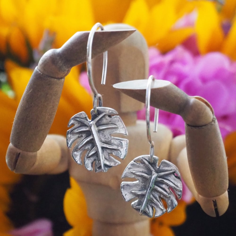Fine silver monstera earrings on hand formed sterling silver wires