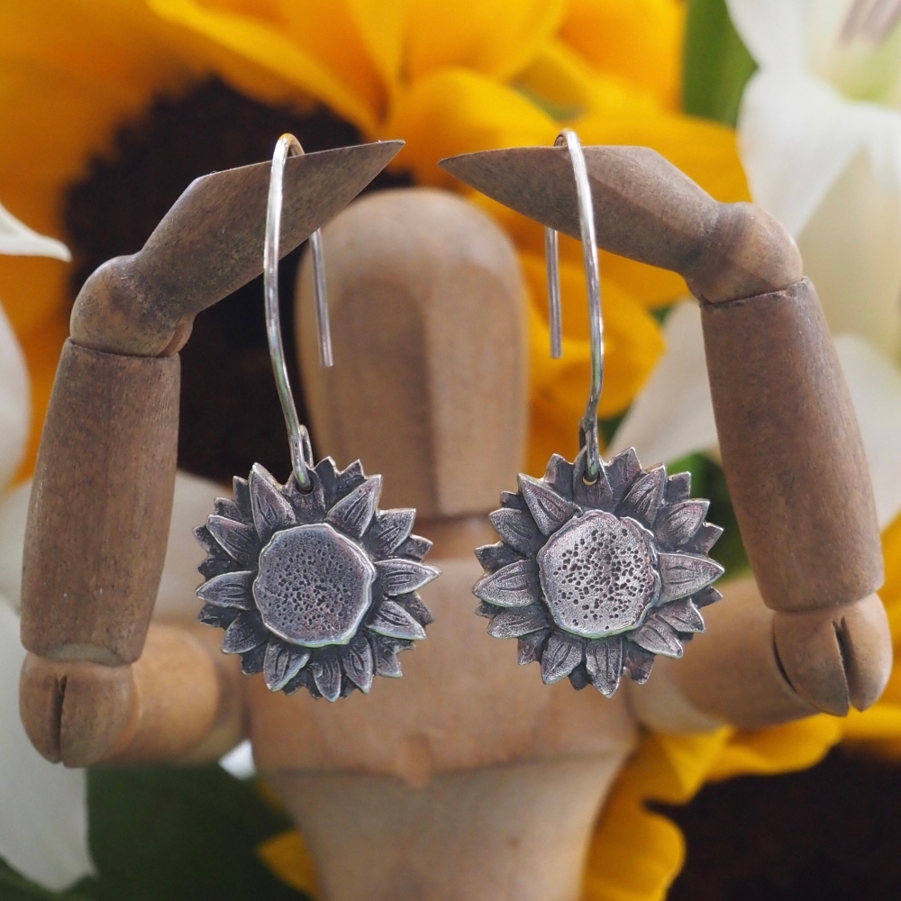 Fine silver sunflower earrings on hand formed sterling silver wires