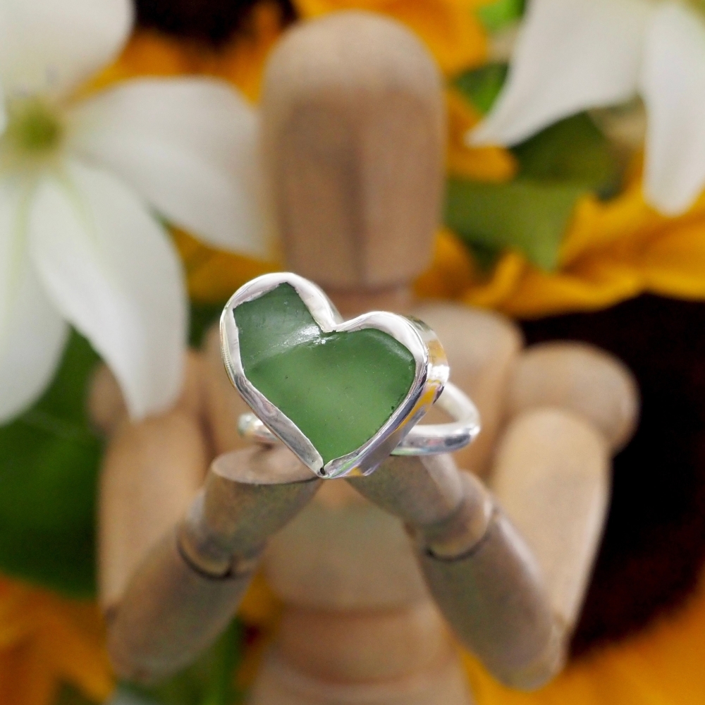 Sterling silver ring with small green 'sea glass' heart