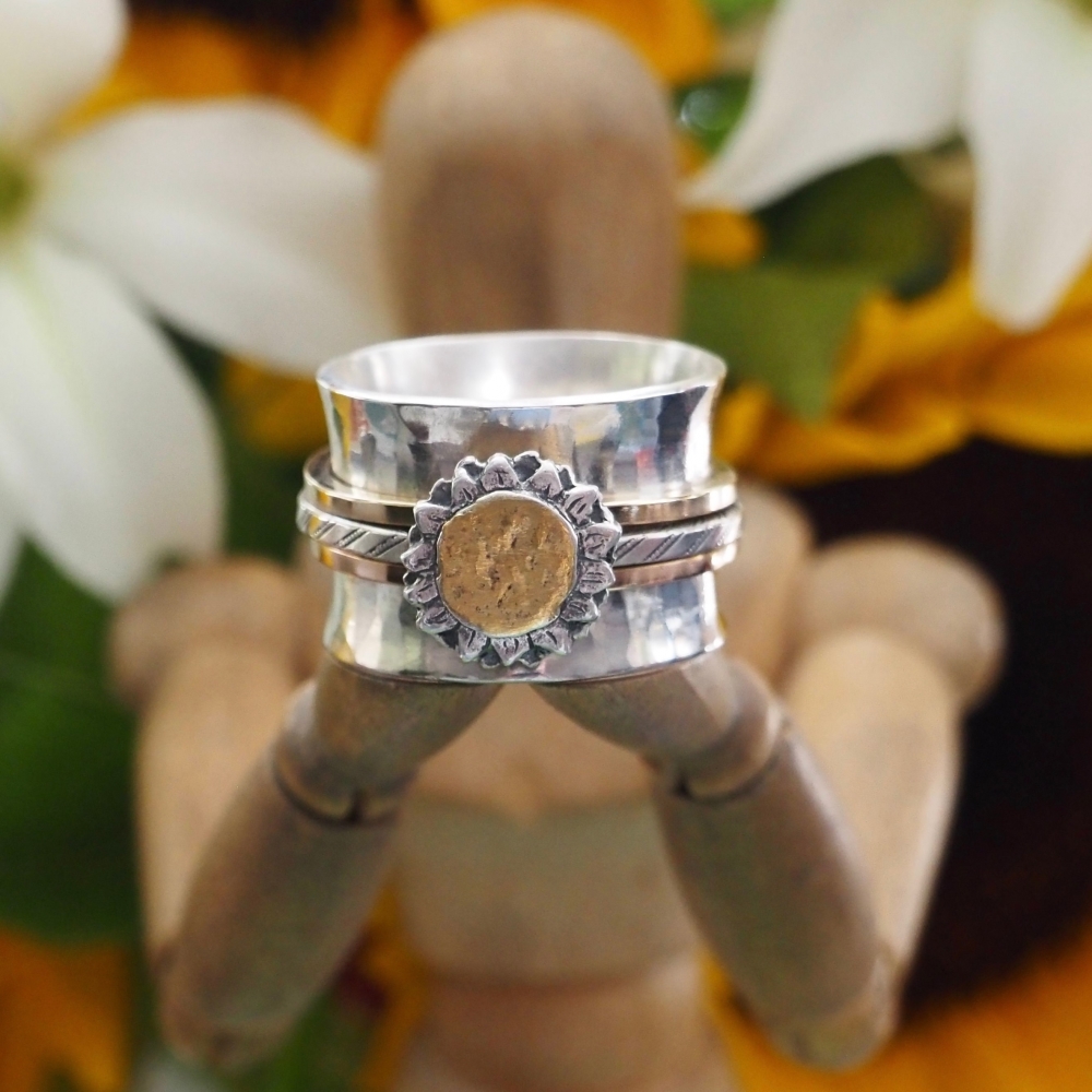 Sterling silver spinner ring with gold highlighted sunflower