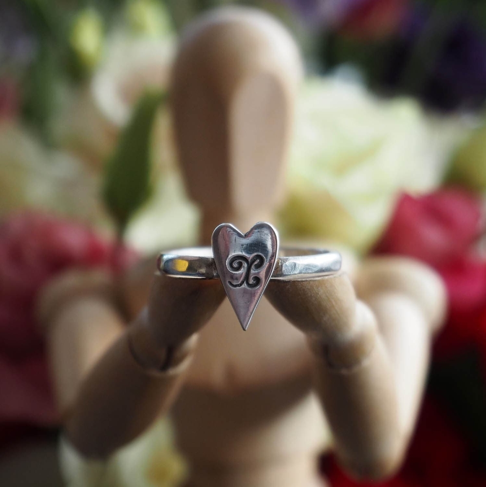 Sterling silver ring with fine silver heart