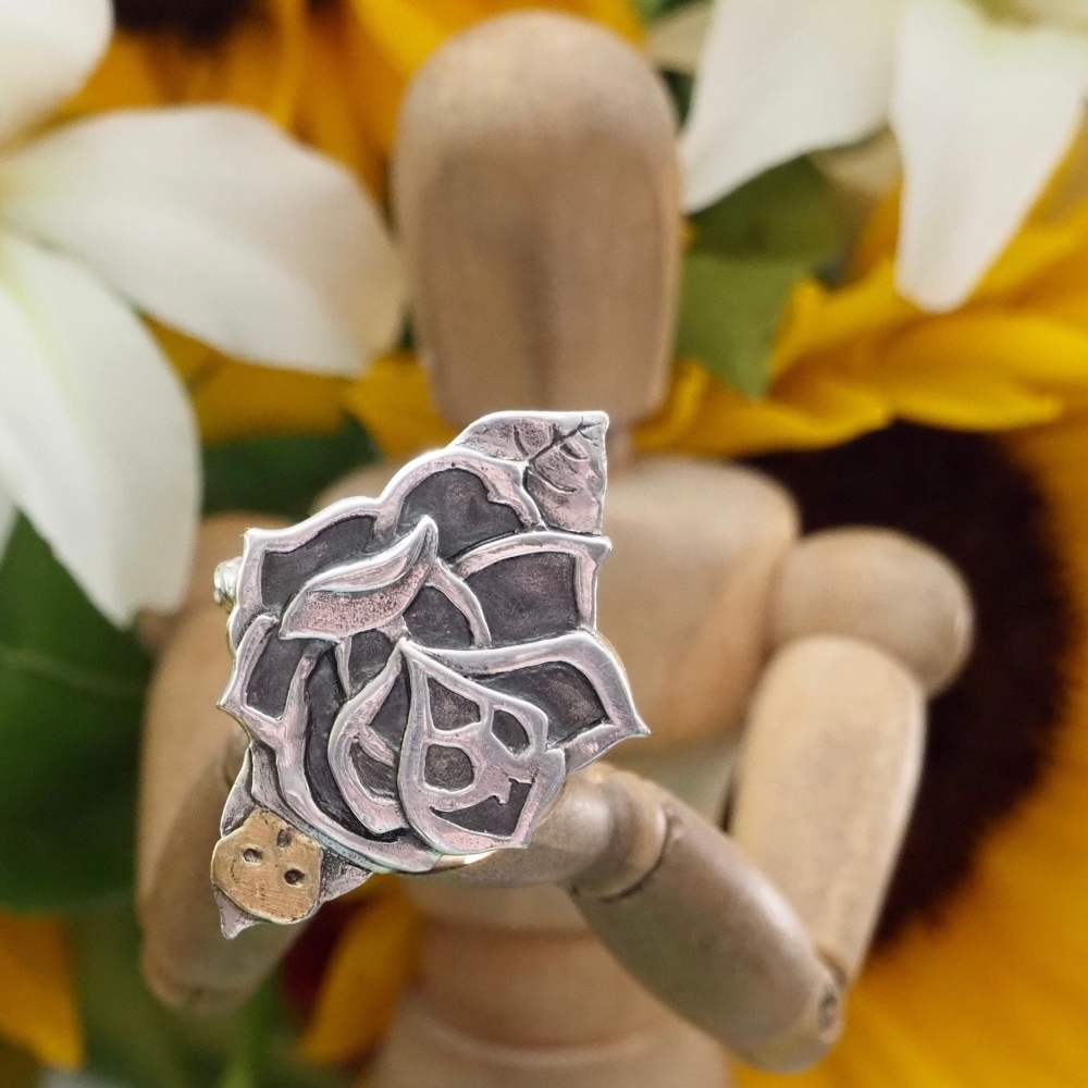 Sterling silver ring with tattoo style rose