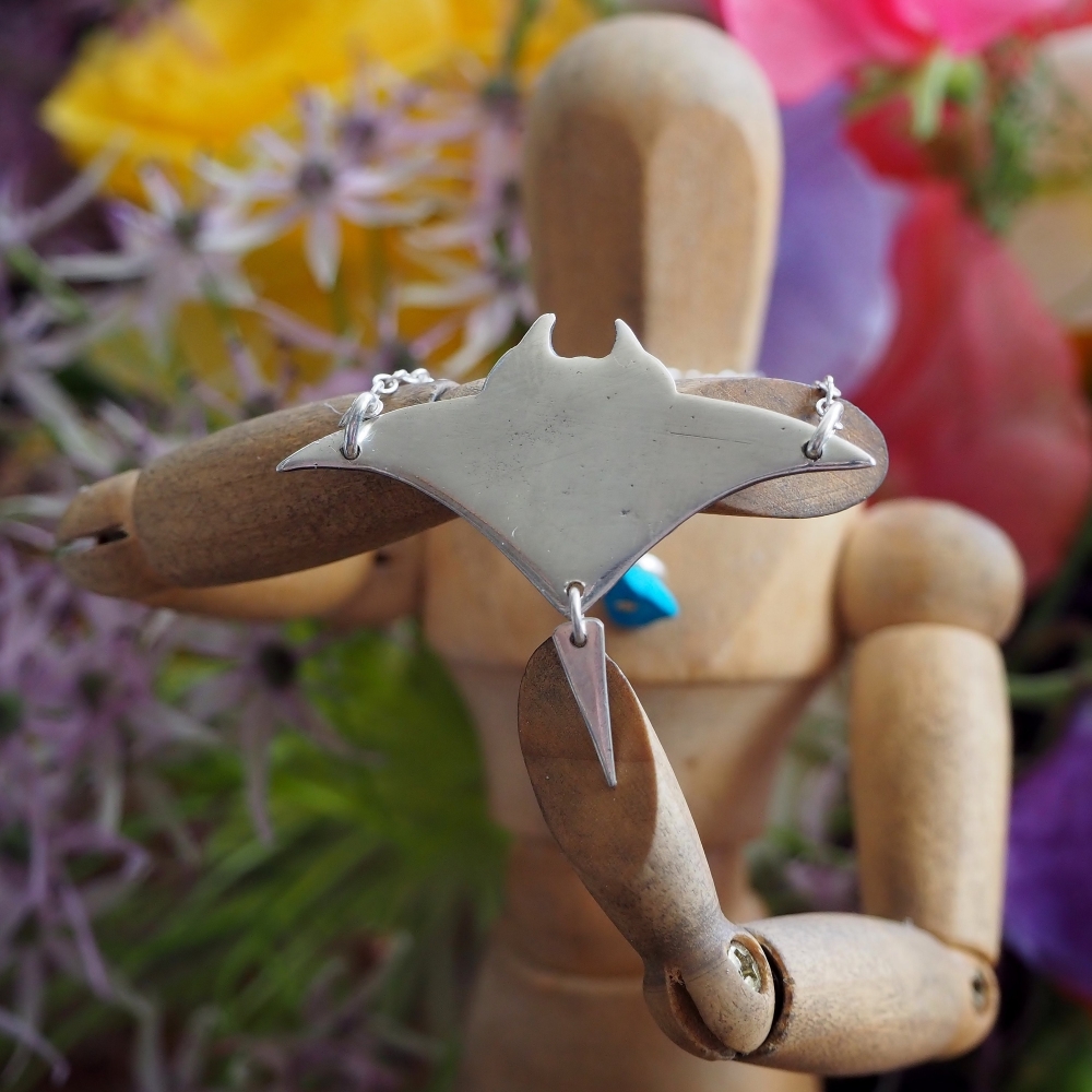 Fine silver manta ray on a sterling silver chain