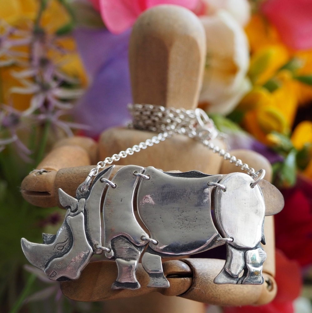 Fine silver articulated rhino on a sterling silver chain