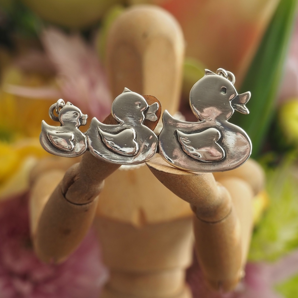 Fine silver rubber ducks on a sterling silver chain