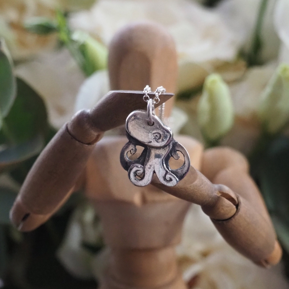 Fine silver tiny octopus on a sterling silver chain