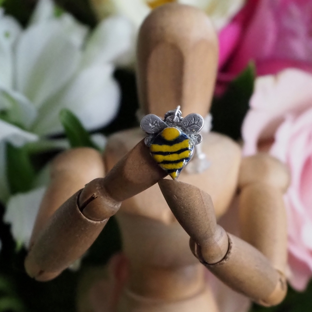 Fine silver enamelled bee on a sterling silver chain