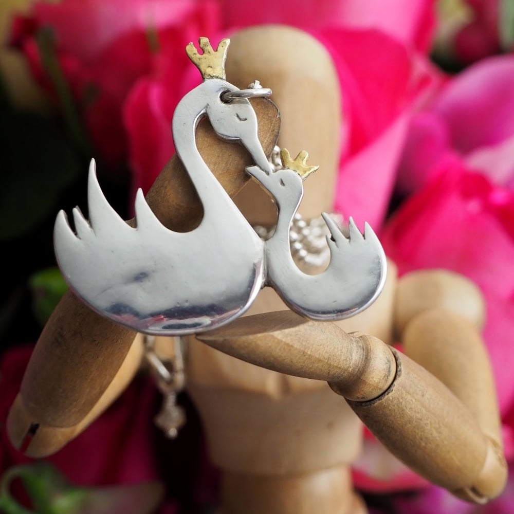 Fine silver swan and cygnet on a sterling silver chain