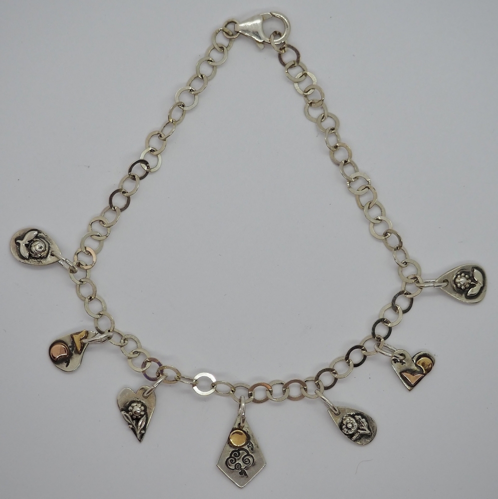 Hand formed chain with recycled silver and gold charms