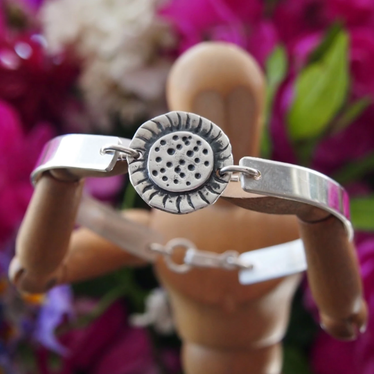 Sterling silver bangle with fine silver sunflower