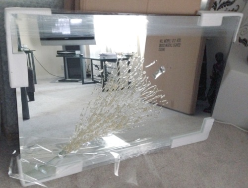 Champagne Explosion in Gold on a Silver Bevelled Mirror