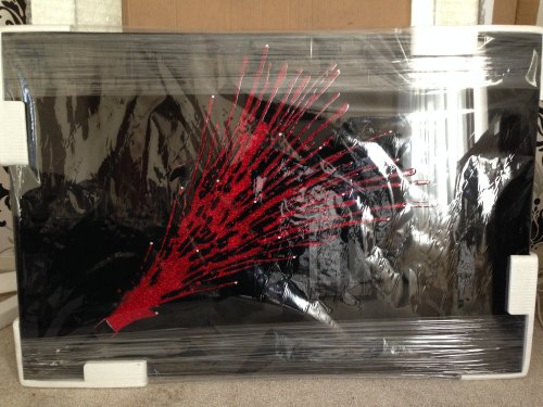 Champagne Explosion in Red on a Black Bevelled Mirror