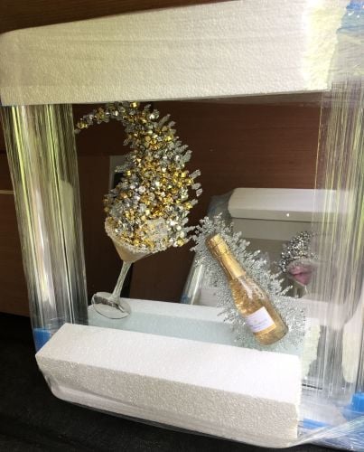 3D Champagne celebration Gold wall art on a Silver mirror in a Brushed silv