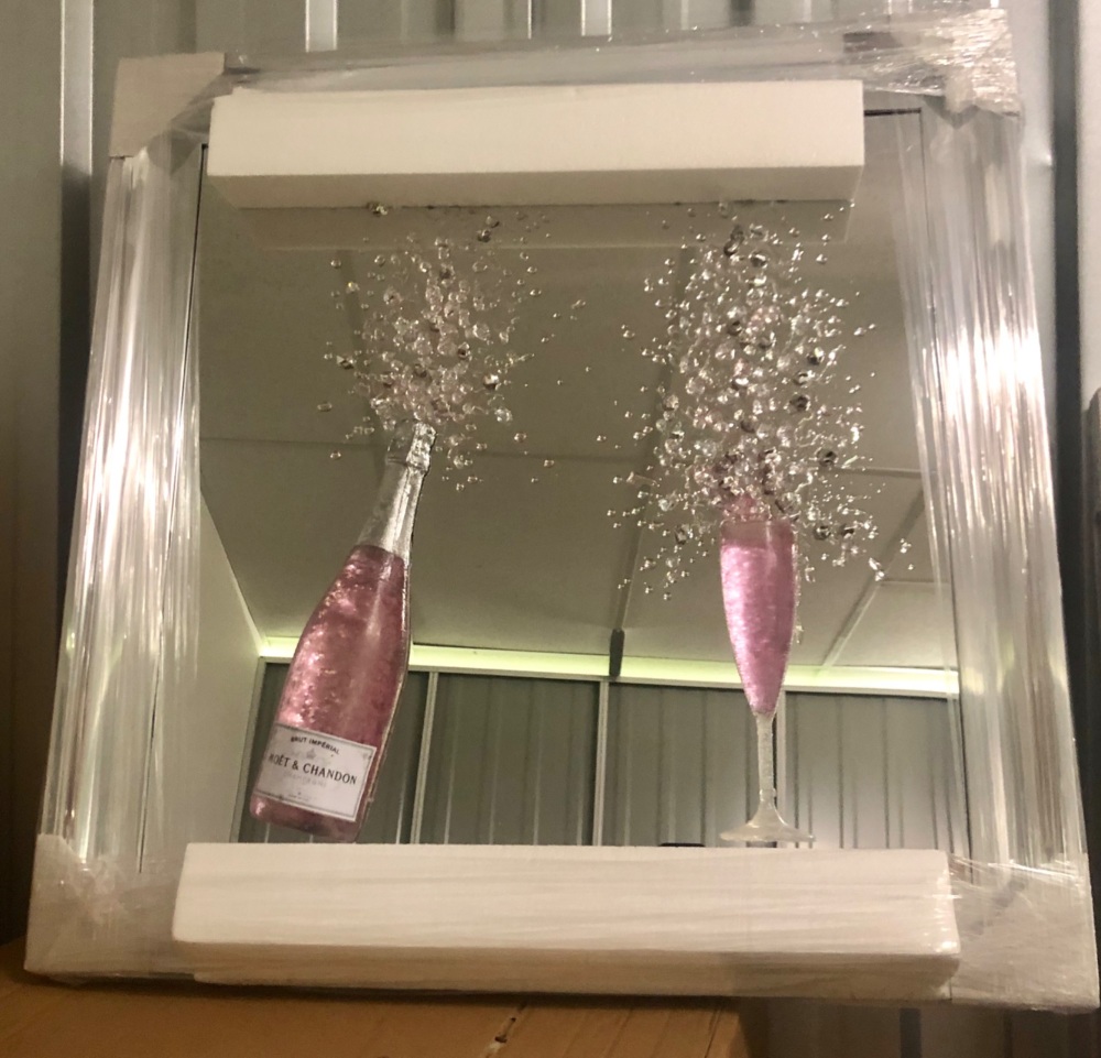 3d Moet Chandon Pink Champagne wall art on a Silver mirror and silver fram