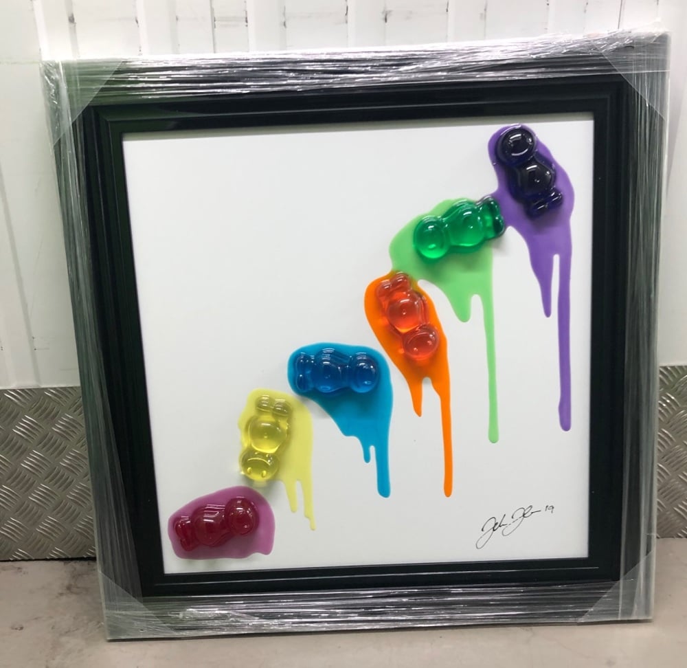 Jake Johnson 3D colourful falling Jelly Babies wall art on a white backgro