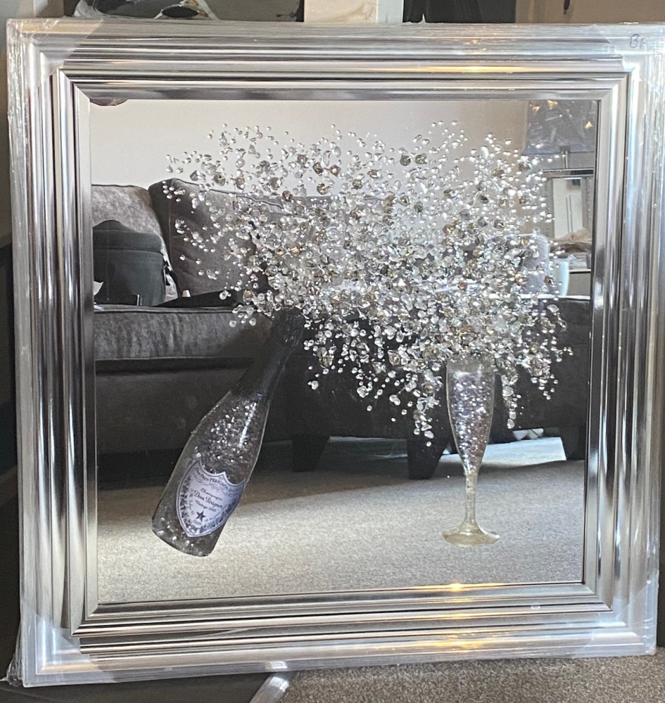 Don Perignon Champagne wall art on a Silver mirror in a chrome silver frame