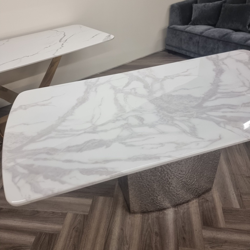 Brand new Roma Dining Table features a beautiful marble top sitting on a hammered metal block base 1.6m