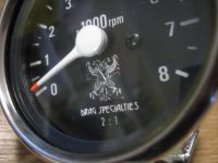 Tachometer 2:1 ratio rev counter for mechanical driven Harley models by Drag Specialities logo on face 