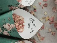 Personalised green and pink floral confetti cones.