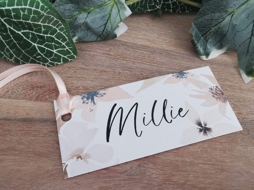 White floral name tag/ place card/gift tag with ribbon or twine.