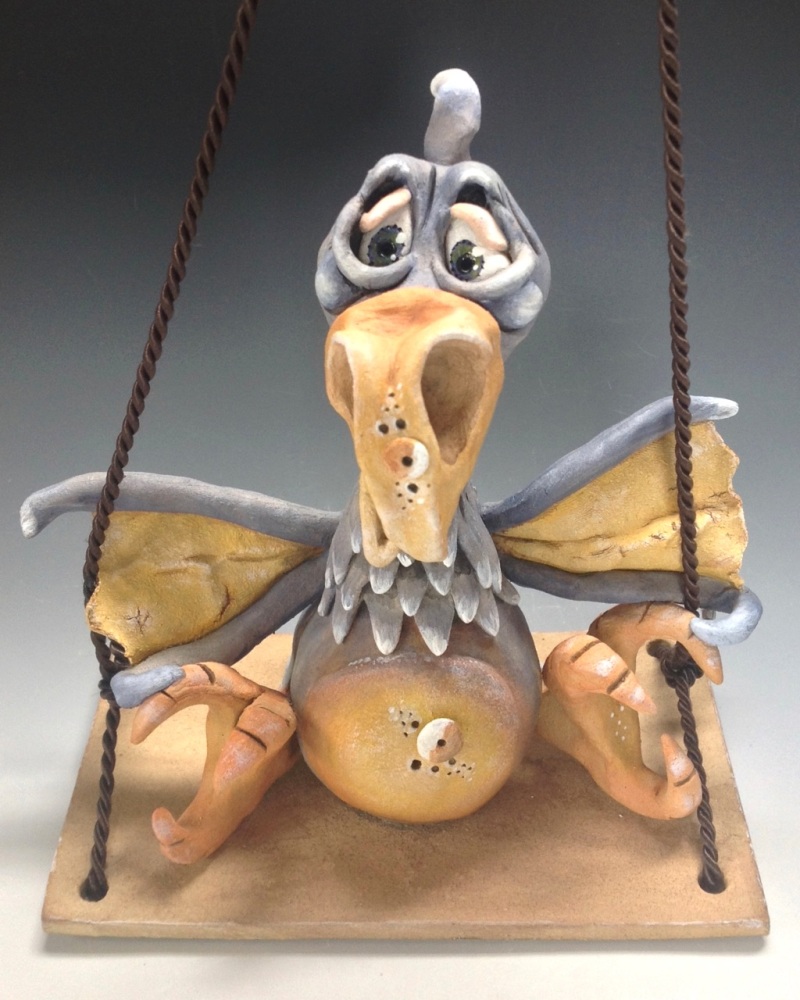 Bird on a Swing Ceramic Sculpture