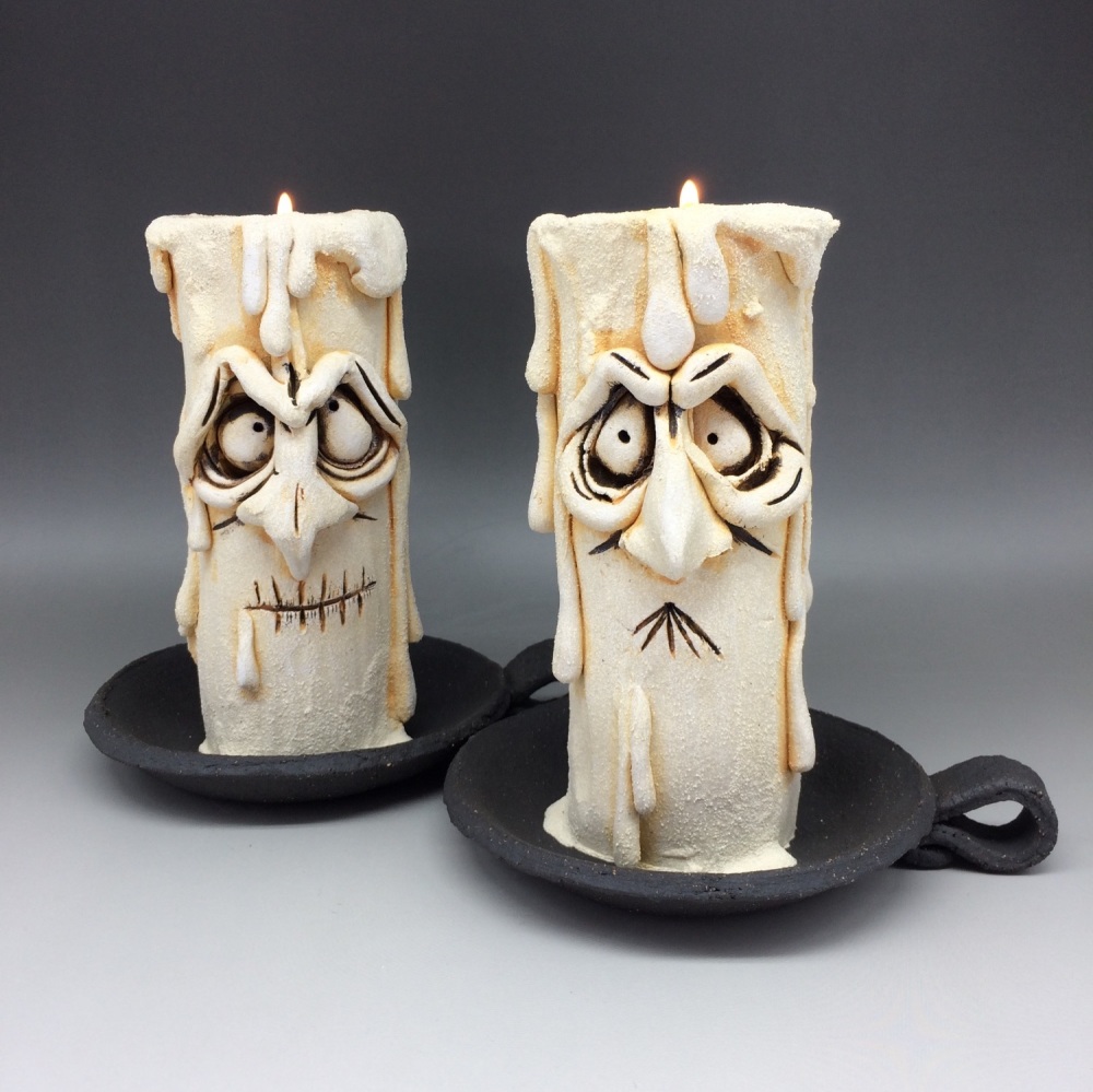 Pair of Grumpy Candle Tea Light Holders 'Dog and Magog'