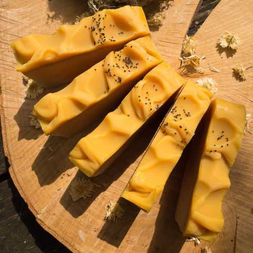 Zesty and lemony Lemon cream handmade soap in the sunshine