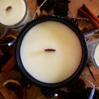 Hand poured essential oil and plant wax candles in Amber jars with wooden wicks. (30cl)