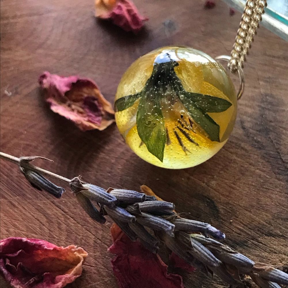 Buttercup Drop pendant on a sterling silver chain. 