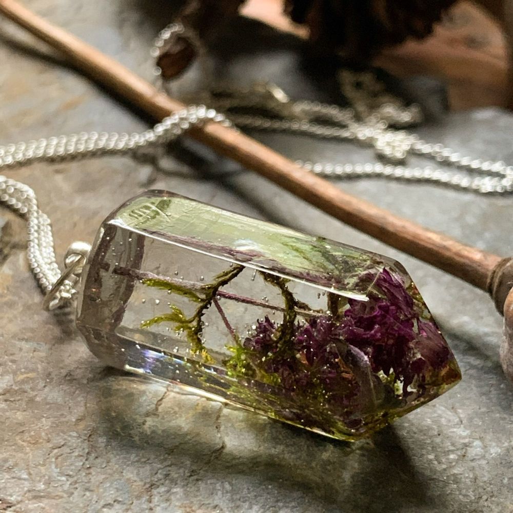 Thyme flower, copper leaf and forest moss crystal point pendant on a 18 inch silver chain. 