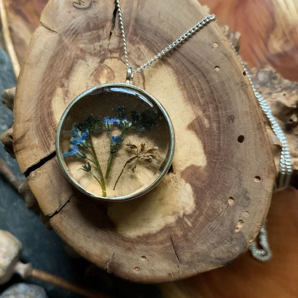 Large Bezel pendant with 'Forget me not' flowers on an 18 inch silver chain