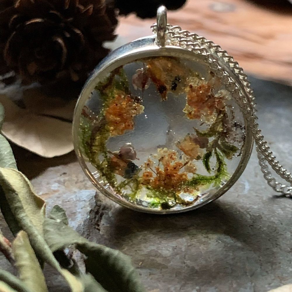 Medium Bezel wreath pendant with 'Forget me not', tiny Queen Anne's Lace flowers and forest moss on an 18 inch silver chain